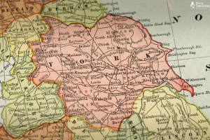 An old map of England highlighting the counties, with a focus on Yorkshire's geographical features and borders.
