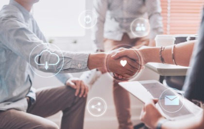 Business people shaking hands, surrounded by icons symbolising trust between employee and manager.