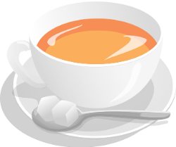 A steaming cup of tea in a white cup and saucer with a silver spoon on the side.