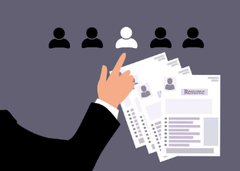 A hand points to a resume featuring profiles of accountants, highlighting their qualifications and experience.