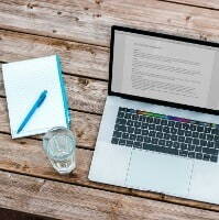 Laptop screen displaying a candidate's accountancy and finance CV, illustrating key points to feature on a CV.