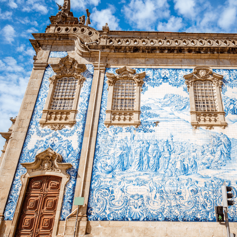 Igreja do Carmo in Porto, Portugal, featuring striking blue and white tiled facade.