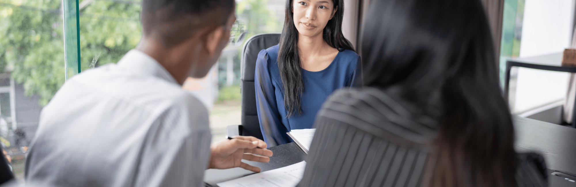 A man and woman engage in a conversation, discussing topics related to salary and employment.